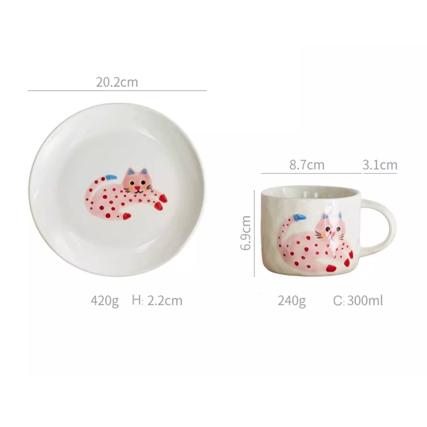 Handmade ceramic mug with pink cat design