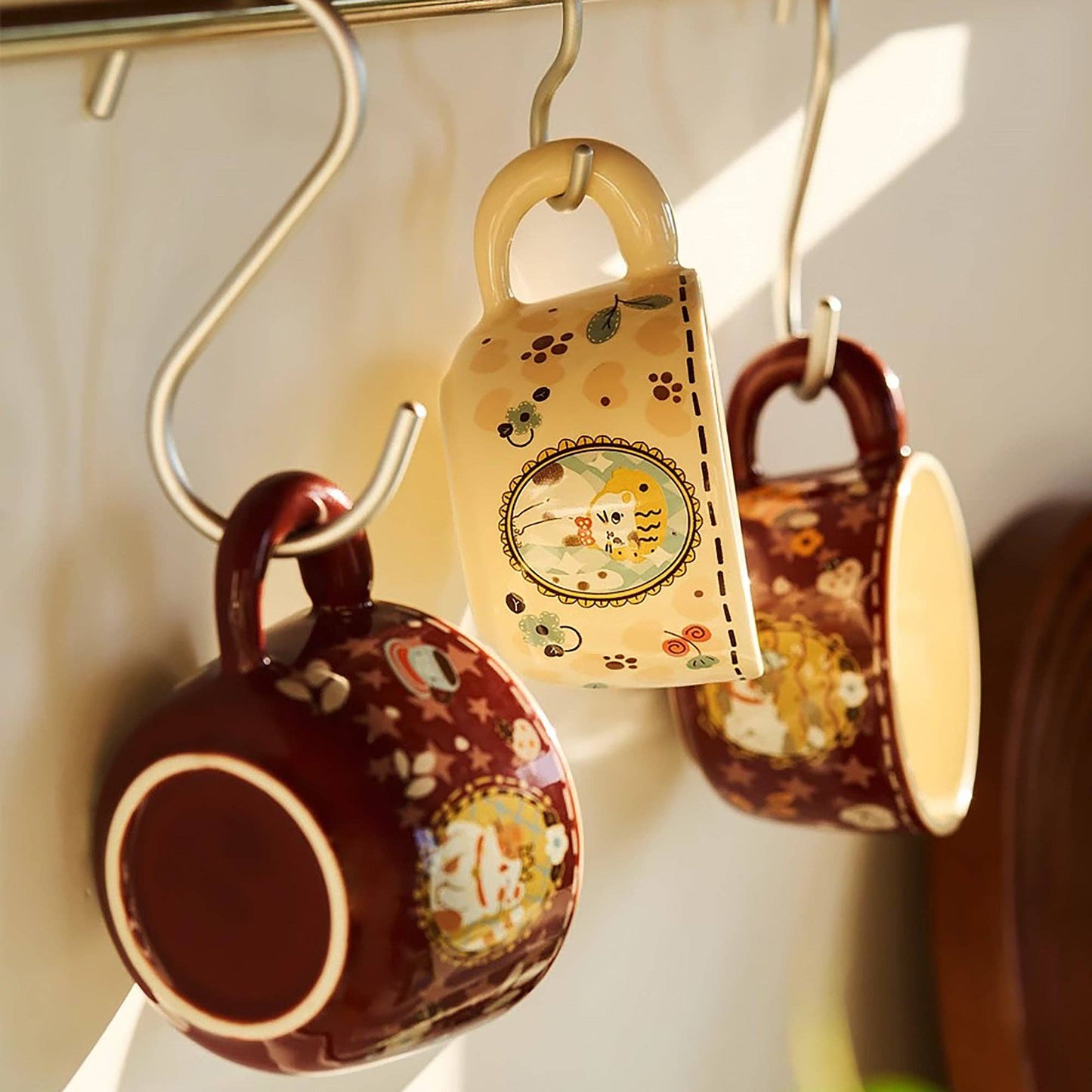 Ceramic mug with cat illustration