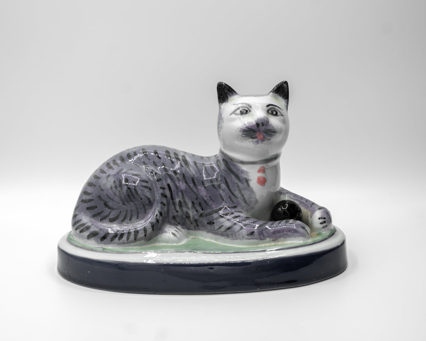 Vintage Staffordshire-style Recumbent Cat Figurine