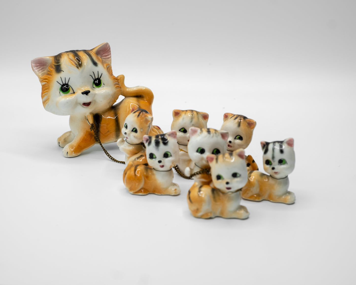 Chain Gang of Mother and Kittens Family