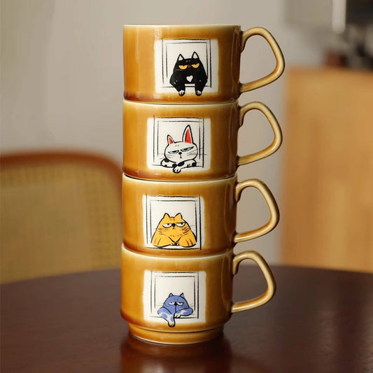 Ceramic coffee mug with cat illustration