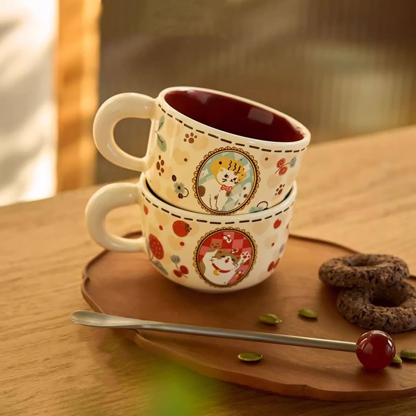 Ceramic mug with cat illustration
